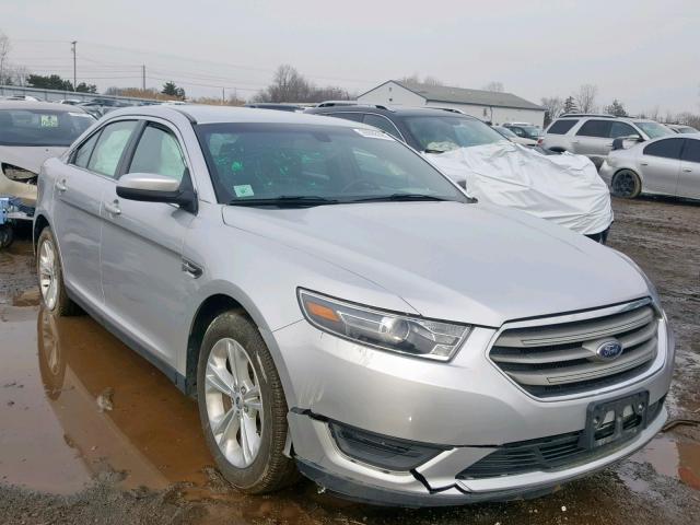 1FAHP2H82GG140563 - 2016 FORD TAURUS SEL SILVER photo 1