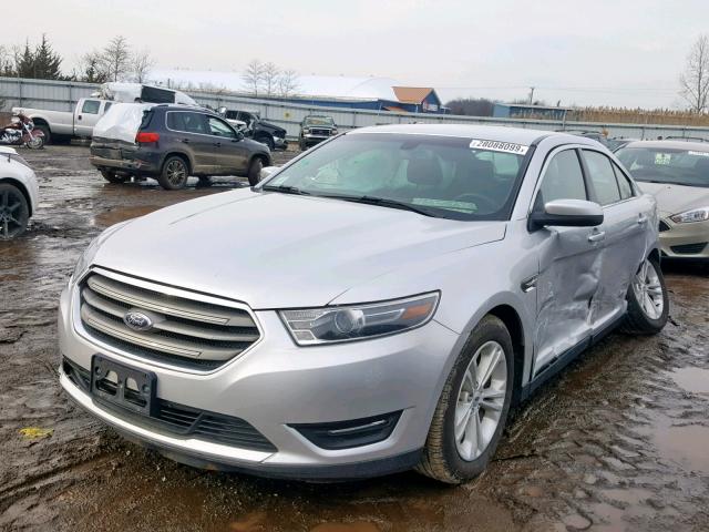 1FAHP2H82GG140563 - 2016 FORD TAURUS SEL SILVER photo 2