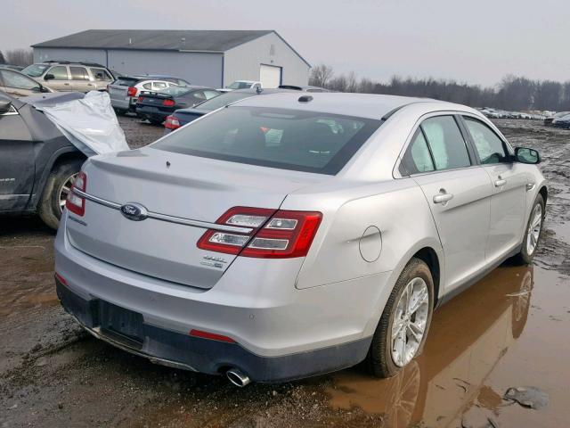 1FAHP2H82GG140563 - 2016 FORD TAURUS SEL SILVER photo 4