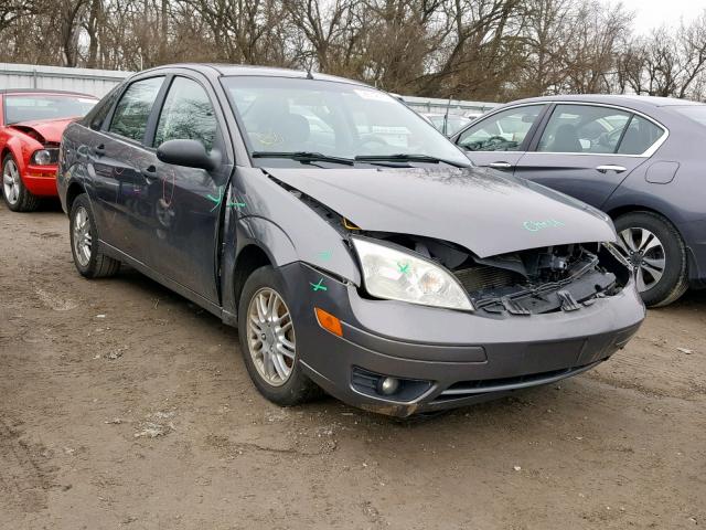 1FAHP34NX6W131504 - 2006 FORD FOCUS ZX4 GRAY photo 1