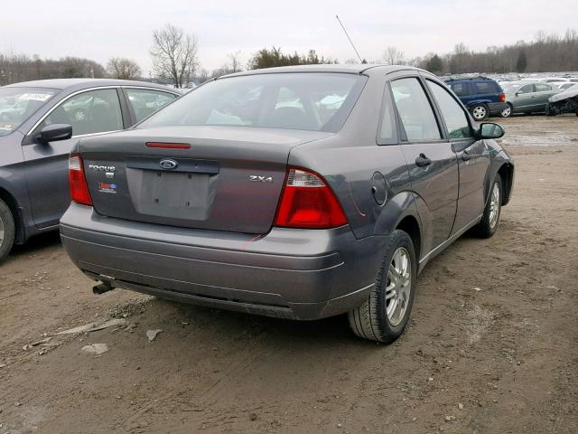 1FAHP34NX6W131504 - 2006 FORD FOCUS ZX4 GRAY photo 4