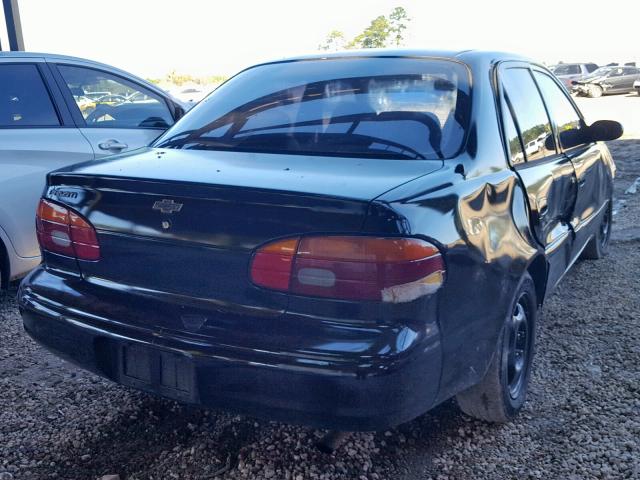 1Y1SK5281WZ420076 - 1998 CHEVROLET GEO PRIZM BLACK photo 4