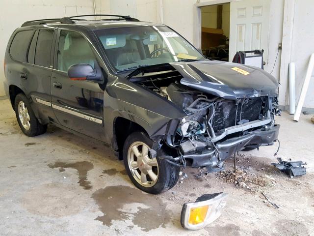 1GKDT13S122142011 - 2002 GMC ENVOY BLACK photo 1