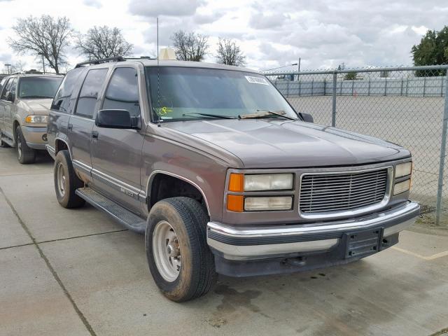 1GKEK13R1VJ725354 - 1997 GMC YUKON BROWN photo 1