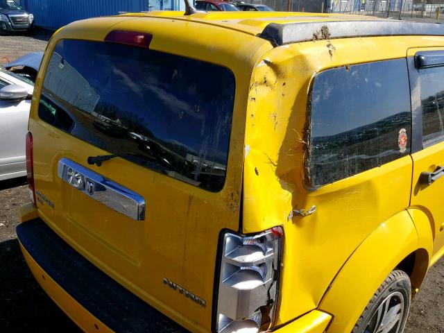 1D4PU7GX9BW518609 - 2011 DODGE NITRO SHOC YELLOW photo 9