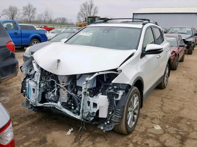 JTMDFREV1JD255386 - 2018 TOYOTA RAV4 LIMIT WHITE photo 2