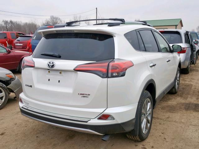 JTMDFREV1JD255386 - 2018 TOYOTA RAV4 LIMIT WHITE photo 4