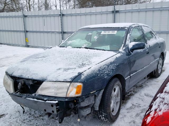 4T1BF18B5XU311098 - 1999 TOYOTA AVALON XLE GREEN photo 2