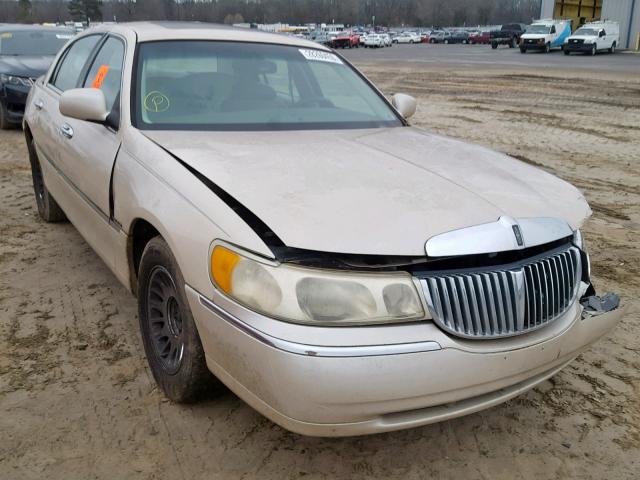 1LNHM83W9XY661832 - 1999 LINCOLN TOWN CAR C TAN photo 1