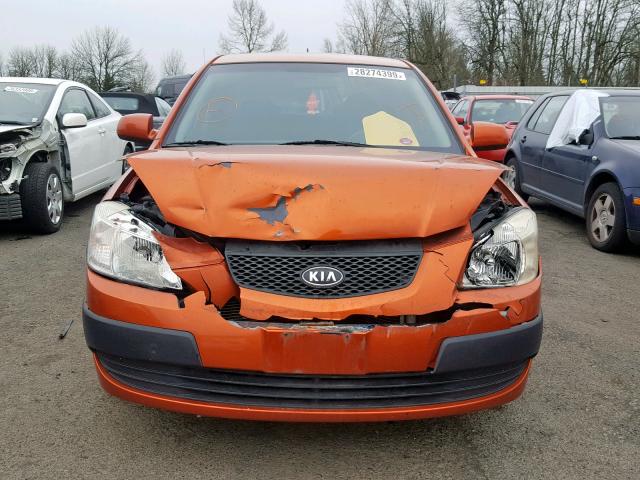 KNADE223396538219 - 2009 KIA RIO BASE ORANGE photo 9