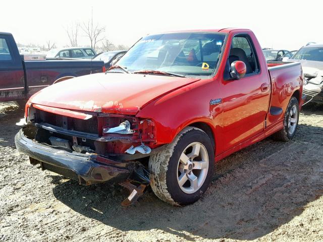 2FTZF0734YCB15713 - 2000 FORD F150 SVT L RED photo 2