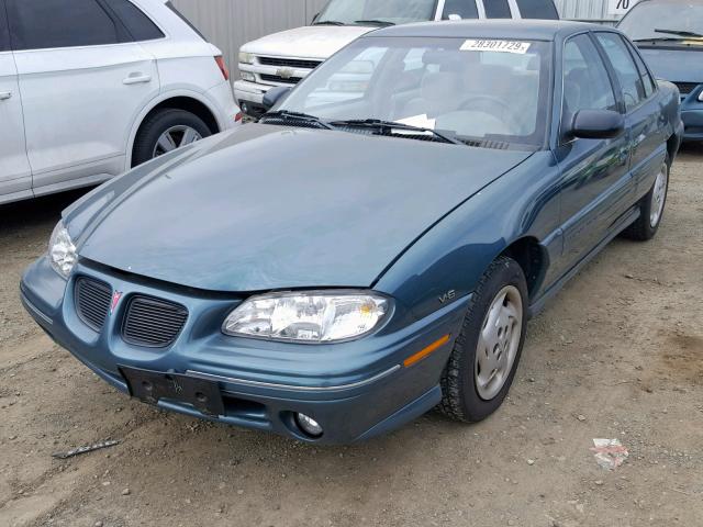 1G2NE52M9WC772304 - 1998 PONTIAC GRAND AM S TEAL photo 2