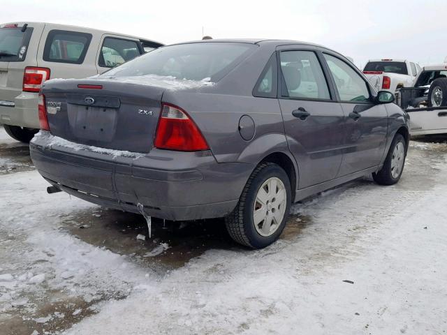 1FAFP34N56W182495 - 2006 FORD FOCUS ZX4 GRAY photo 4