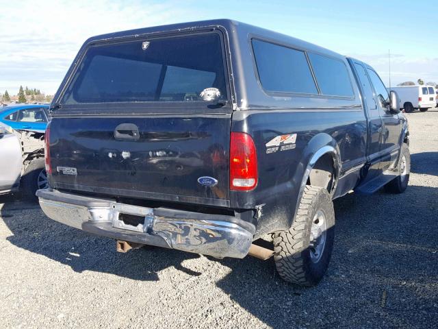 1FTSX31S7XEC41007 - 1999 FORD F350 SRW S BLACK photo 4