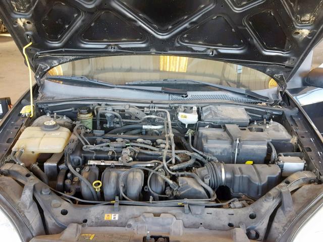 1FAFP34NX6W136368 - 2006 FORD FOCUS ZX4 BLACK photo 7