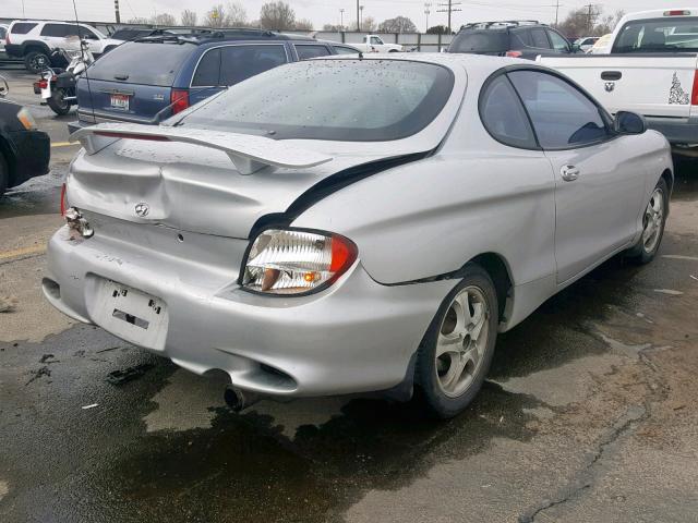 KMHJG35F51U219458 - 2001 HYUNDAI TIBURON SILVER photo 4