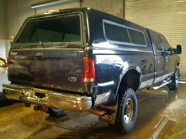 1FTSW31F21EA51287 - 2001 FORD F350 SRW S BLACK photo 4