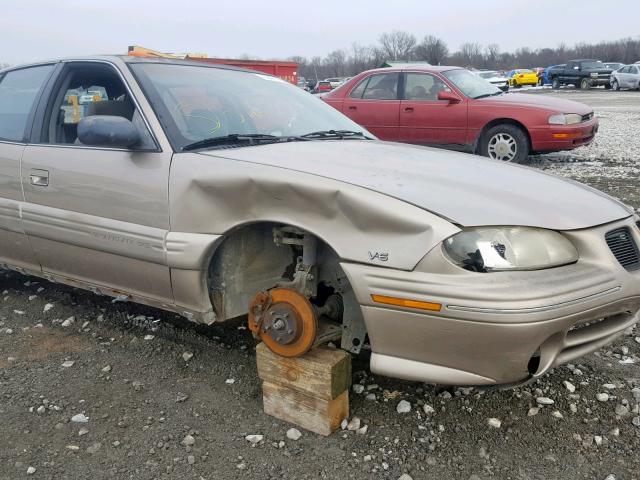 1G2NE52M9VC822052 - 1997 PONTIAC GRAND AM S GOLD photo 9