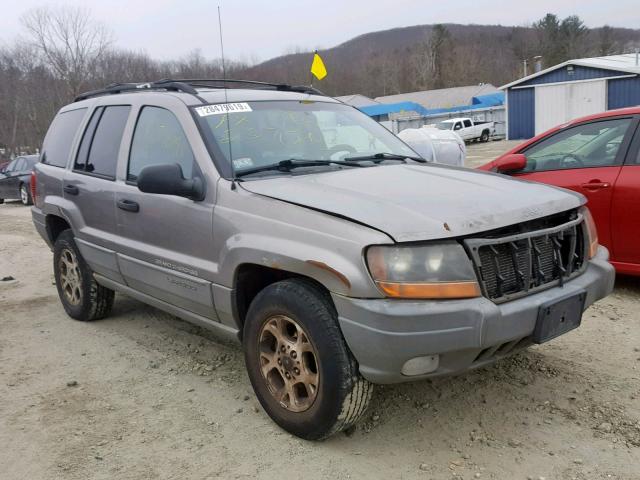 1J4GW58S1XC649633 - 1999 JEEP GRAND CHER GRAY photo 1