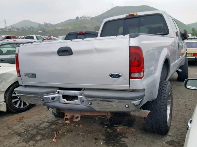 1FTSW30S64EB10618 - 2004 FORD F350 SRW S SILVER photo 4