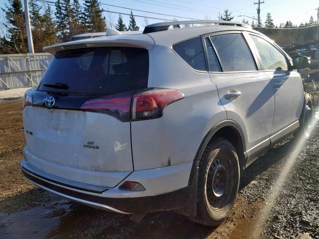 JTMJJREV4JD211688 - 2018 TOYOTA RAV4 HV SE WHITE photo 4