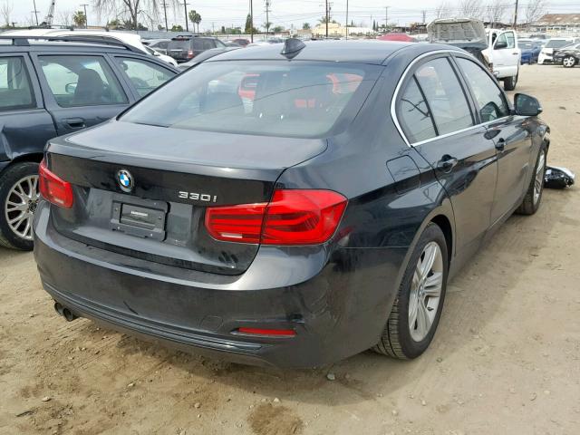 WBA8B9G55JNU99138 - 2018 BMW 330 I BLACK photo 4