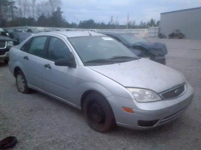 1FAFP34N05W110800 - 2005 FORD FOCUS ZX4 GRAY photo 1