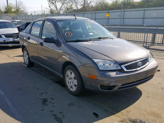 1FAHP34N97W362637 - 2007 FORD FOCUS ZX4 GRAY photo 1