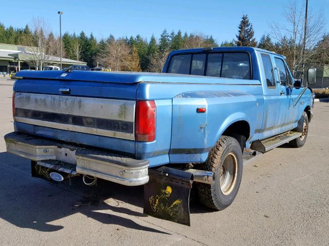 1FTJX35M1PKB91522 - 1993 FORD F350 BLUE photo 4