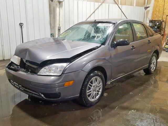 1FAHP34N97W359933 - 2007 FORD FOCUS ZX4 GRAY photo 2