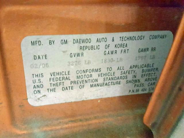 KL1TD62695B415598 - 2005 CHEVROLET AVEO BASE ნარინჯისფერი ფოტო 10