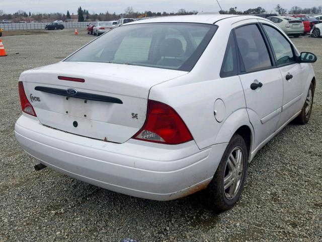 1FAFP34Z23W299742 - 2003 FORD FOCUS SE C WHITE photo 4