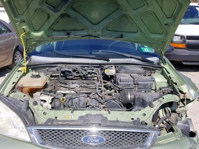 1FAFP34N77W141643 - 2007 FORD FOCUS ZX4 GREEN photo 7