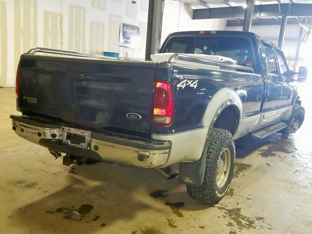 1FTSW31F22EB18312 - 2002 FORD F350 SRW S BLUE photo 4