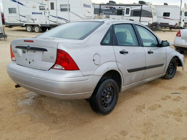 1FAFP33P4YW111701 - 2000 FORD FOCUS LX SILVER photo 4