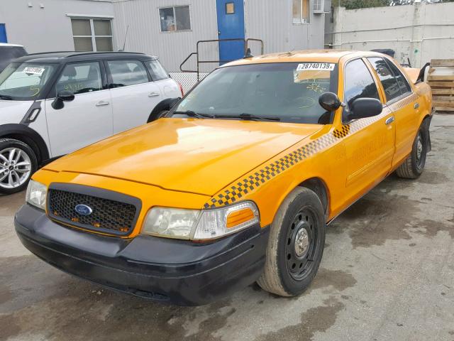 2FABP7BV6AX106208 - 2010 FORD CROWN VICT YELLOW photo 2