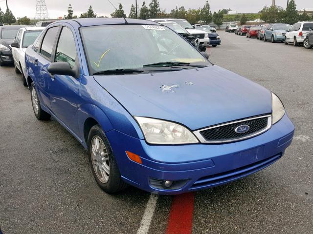 1FAFP34NX5W304685 - 2005 FORD FOCUS ZX4 BLUE photo 1