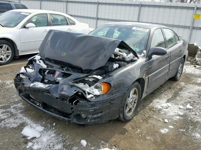 1G2NW52EX2M712915 - 2002 PONTIAC GRAND AM G BLACK photo 2