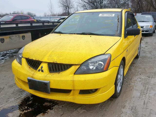 JA3AJ66F45U602124 - 2005 MITSUBISHI LANCER RAL YELLOW photo 2