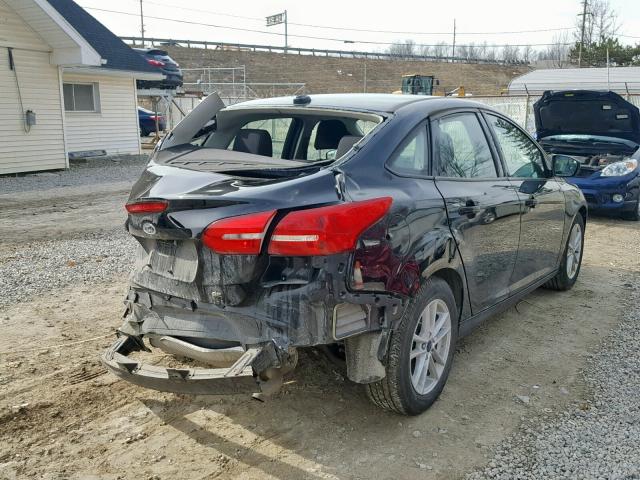 1FADP3F23JL235182 - 2018 FORD FOCUS SE BLACK photo 4