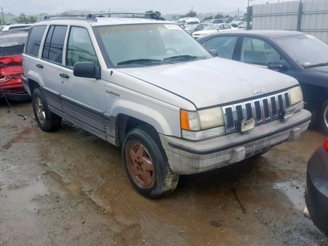 1J4GZ58Y8SC714014 - 1995 JEEP GRAND CHER TAN photo 1