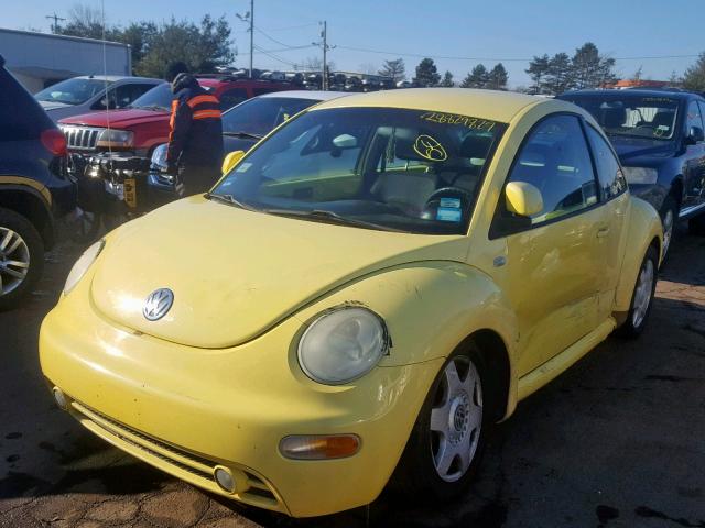 3VWCC21C1XM425014 - 1999 VOLKSWAGEN NEW BEETLE Gelb Foto 2