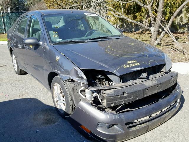 1FAFP34N55W273667 - 2005 FORD FOCUS ZX4 GRAY photo 1