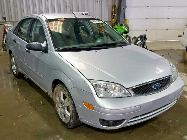 1FAFP34N25W298672 - 2005 FORD FOCUS ZX4 GRAY photo 1