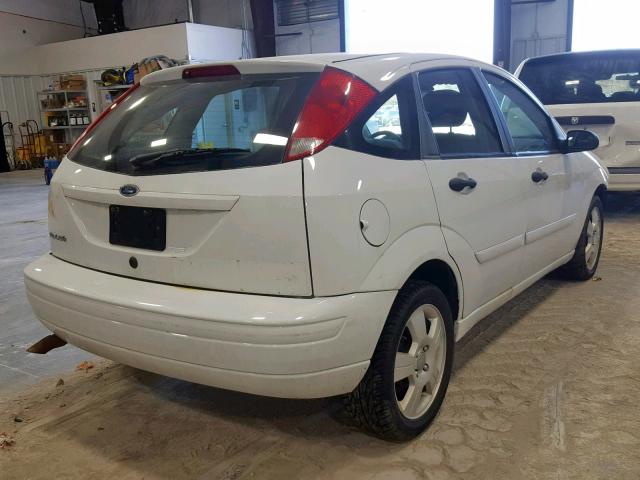 1FAHP37N27W339860 - 2007 FORD FOCUS ZX5 WHITE photo 4