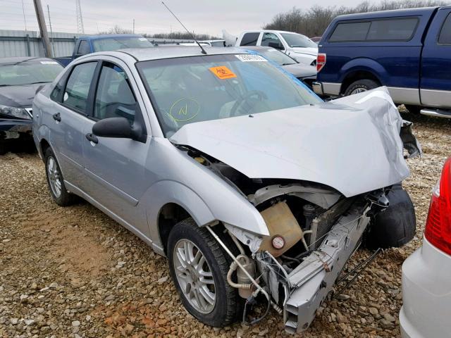 1FAFP34N05W123093 - 2005 FORD FOCUS ZX4 SILVER photo 1