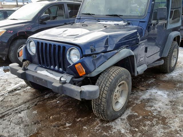 1J4FA49S0YP755519 - 2000 JEEP WRANGLER / BLUE photo 9