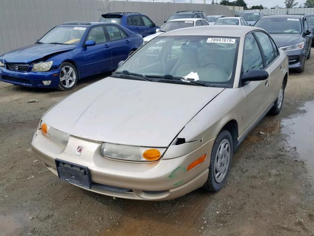 1G8ZH5285YZ131457 - 2000 SATURN SL1 GOLD photo 2