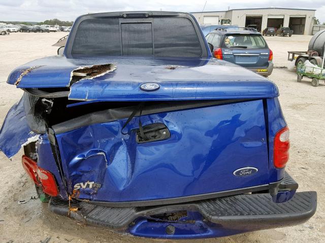 2FTRF07314CA40074 - 2004 FORD F150 SVT L BLUE photo 6