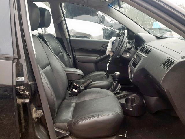 1FAFP37N16W255647 - 2006 FORD FOCUS ZX5 BLACK photo 5